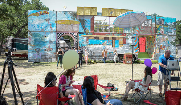 The fun house that came to Reunion for the carnival is the same one used for the 1978 film “Grease.” At right is the scene as production of the YouTube video was about to begin. Messenger Photo by Joe Duty.